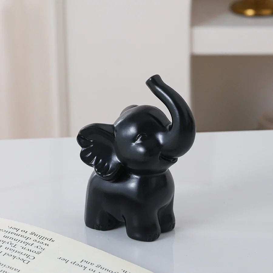 1pc Collectible figurine , Simple modern black and gold elephant ornament home decor small sculpture.