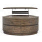 Baisden - Round Lift Top Cocktail Table With Casters - Tobacco
