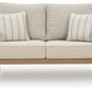 Hallow Creek - Loveseat With Cushion - Driftwood