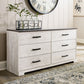 Shawburn - Six Drawer Dresser - Pewter-tone pulls - White / Black / Gray