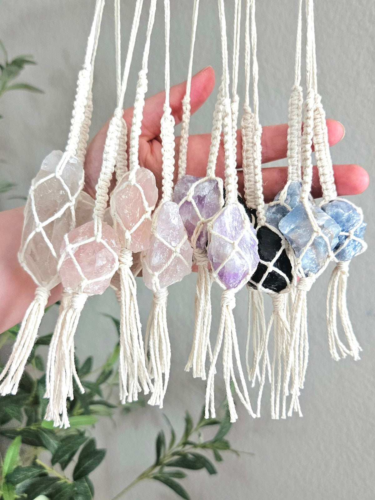 Macrame wrapped crystal rear view mirror charm.