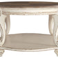 Realyn - Oval Cocktail Table - White / Brown