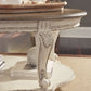 Realyn - Oval Cocktail Table - White / Brown