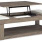 Loyaska - Lift Top Cocktail Table - Grayish Brown / White