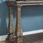 Johnelle - Sofa Table - Gray