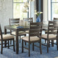 Rokane - Dining Room Table Set (Set of 7) - Brown
