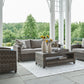 Oasis Court - Sofa, Chairs, Table Set (Set of 4) - Gray