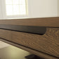 Roanhowe - Rectangular Cocktail Table - Brown