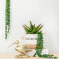 Kneeling Crane Figurine