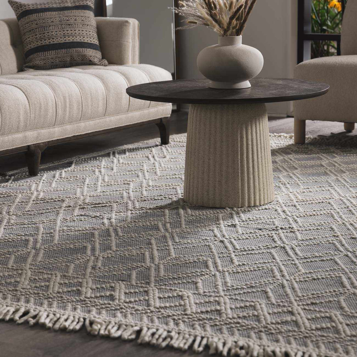 Close merchant photograph of the Ramsbury rug's blue woven texture