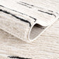 Riad Black Striped White Rug with Tassels