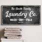 Family Laundry Company Sign