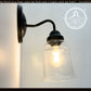 Clear Tiered Bell Wall Sconce
