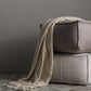 Friendsville Solid & Striped Ivory Pouf