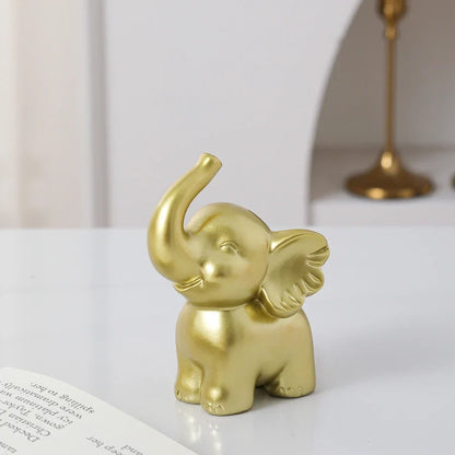1pc Collectible figurine  , Simple modern black and gold elephant ornament home decor small sculpture.