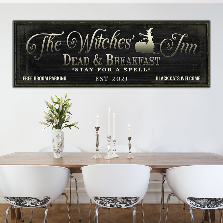 The Witches Inn Sign