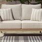 Hallow Creek - Loveseat With Cushion - Driftwood