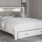 Altyra - King Upholstered Bookcase Bed With Storage - White