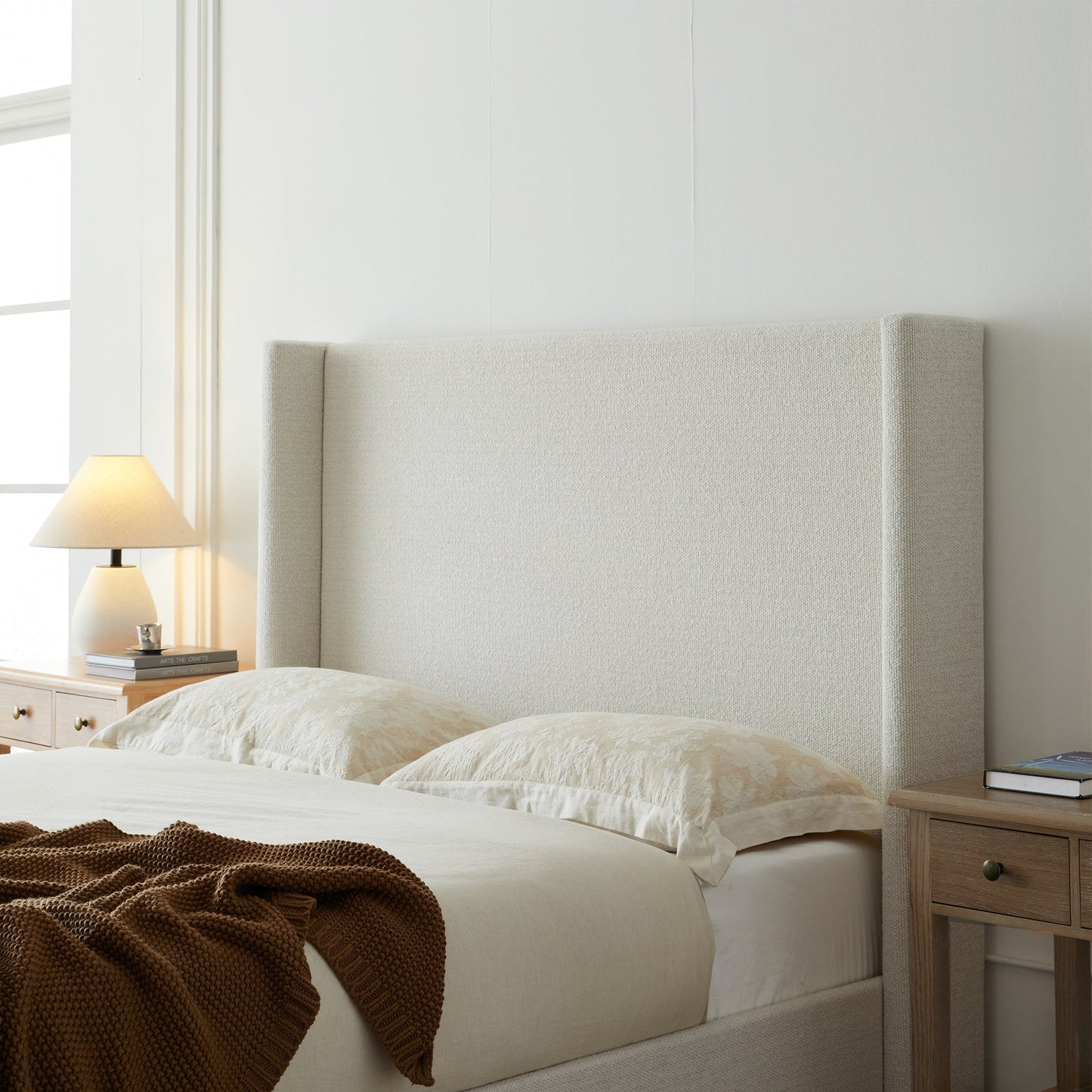 Hosford Upholstered Wingback Bed