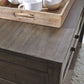Johurst - Sofa Table - Grayish Brown