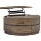 Baisden - Round Lift Top Cocktail Table With Casters - Tobacco