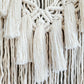 Macrame wall hanging on Manzanita branch.