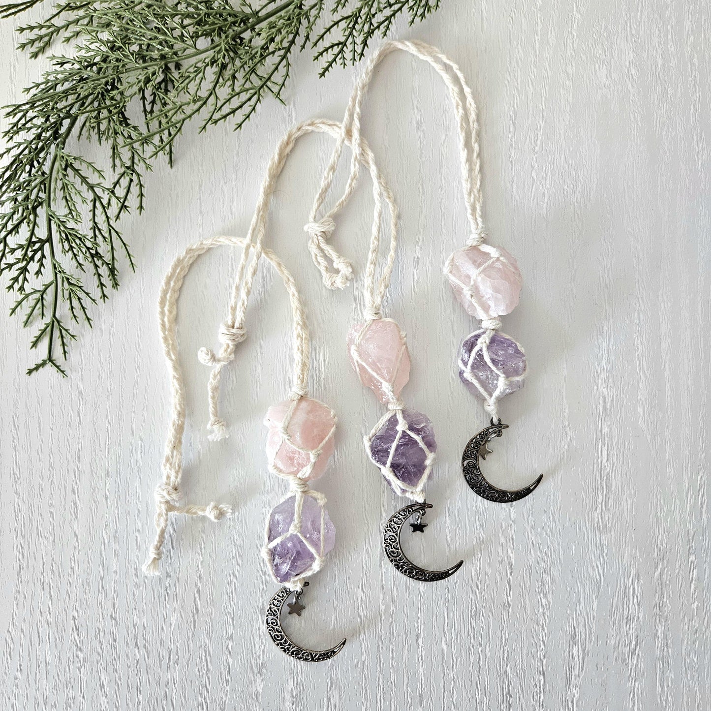 Macrame wrapped crystal rear view mirror charm. Amethyst and rose quartz. With moon charm.