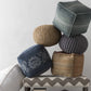 Friendsville Solid & Striped Ivory Pouf